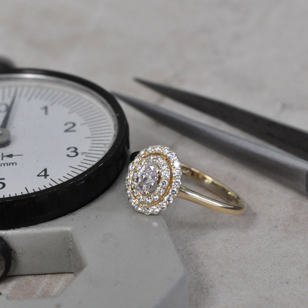 Double Halo Oval Diamond Ring