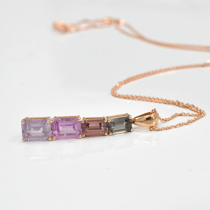 Four emerald cut fancy sapphires ROSE GOLD Pendant