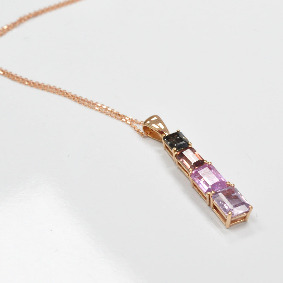 Four emerald cut fancy sapphires ROSE GOLD Pendant