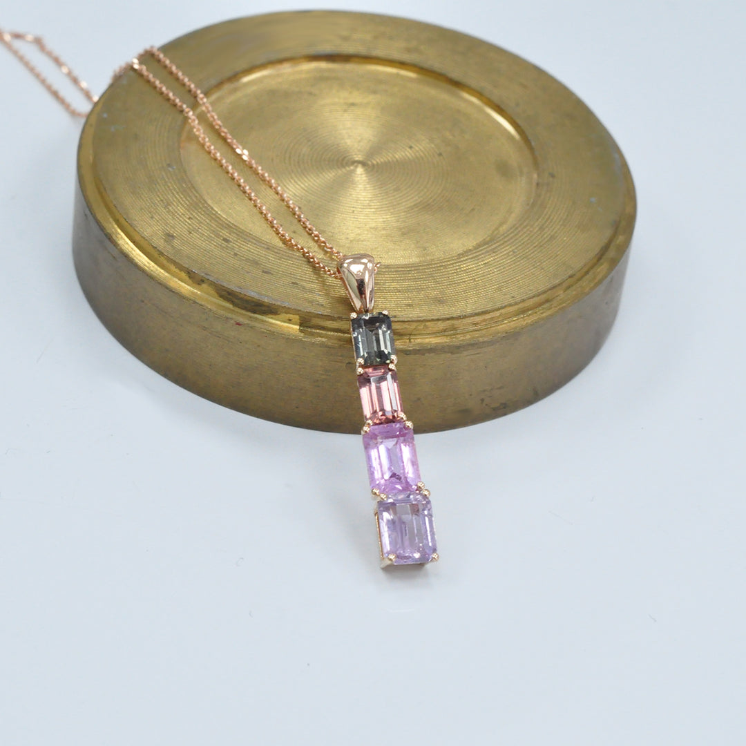 Four emerald cut fancy sapphires ROSE GOLD Pendant