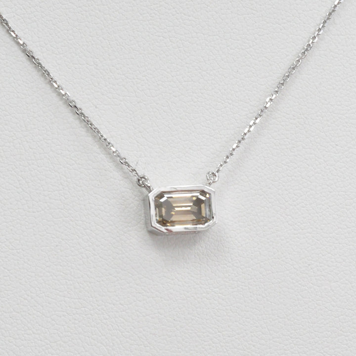bezel set emerald cut brown diamond pendant
