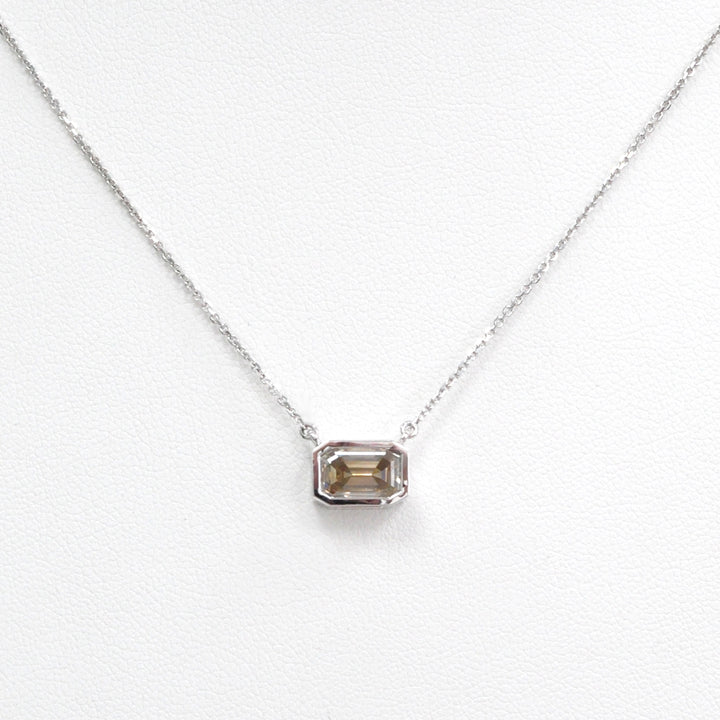bezel set emerald cut brown diamond pendant