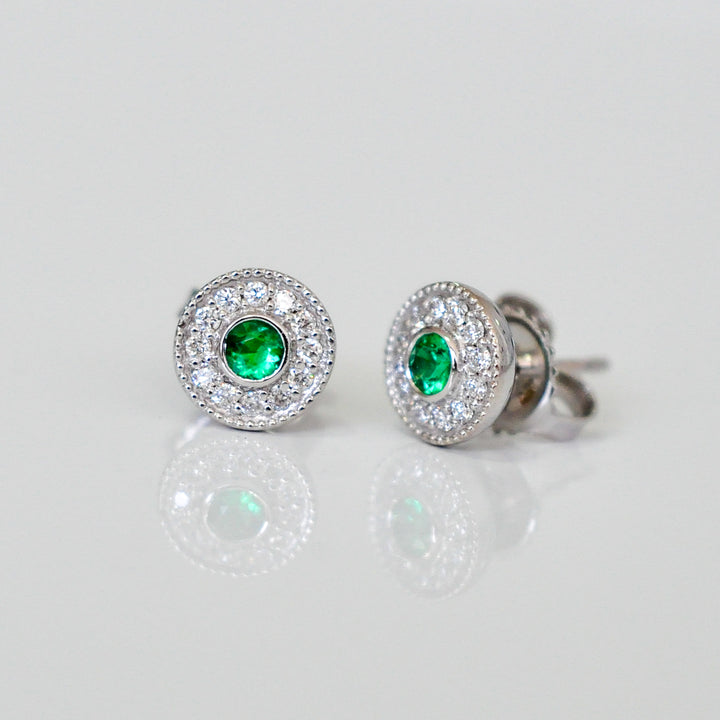 white gold emerald and Diamonds halo Earrings
