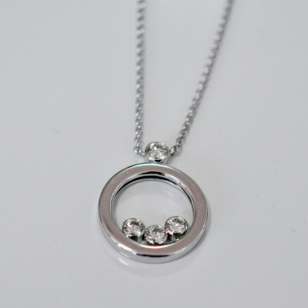 white Gold Circle 4 diamonds pendant