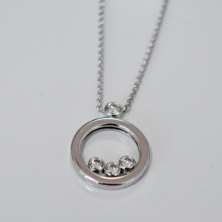 white Gold Circle 4 diamonds pendant