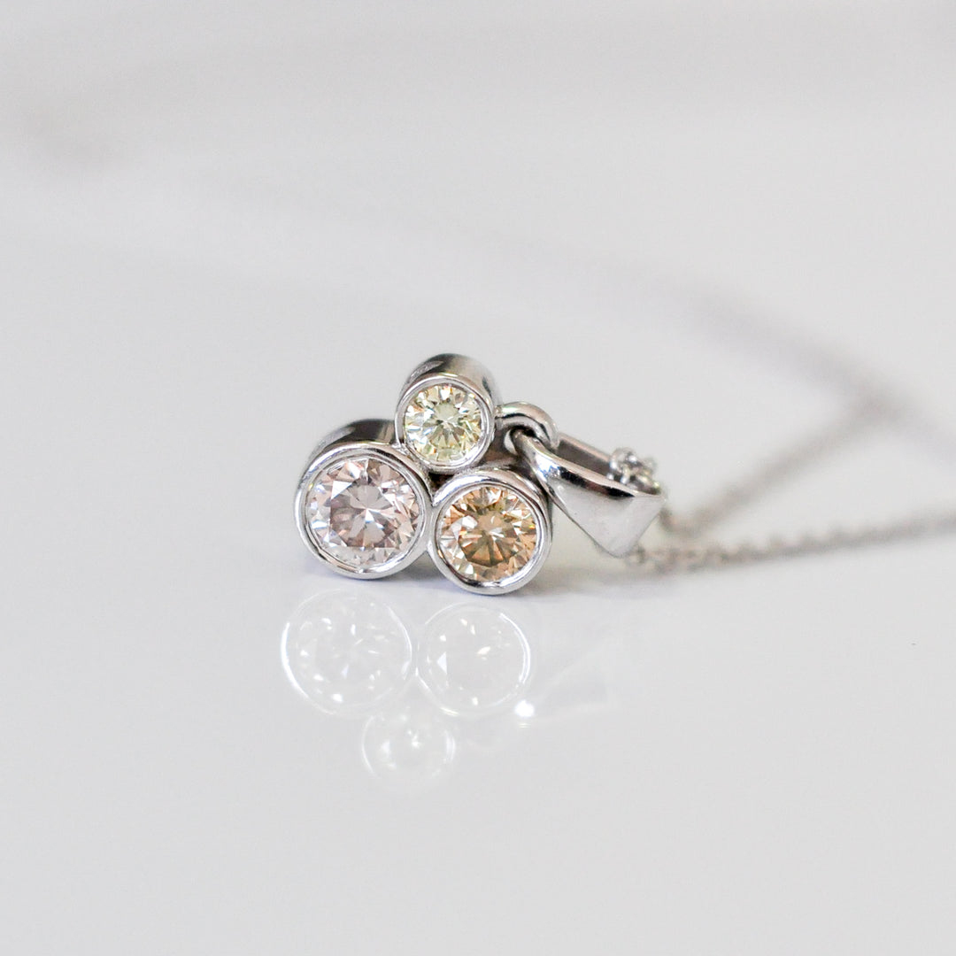 three fancy color diamonds bezel set pendant