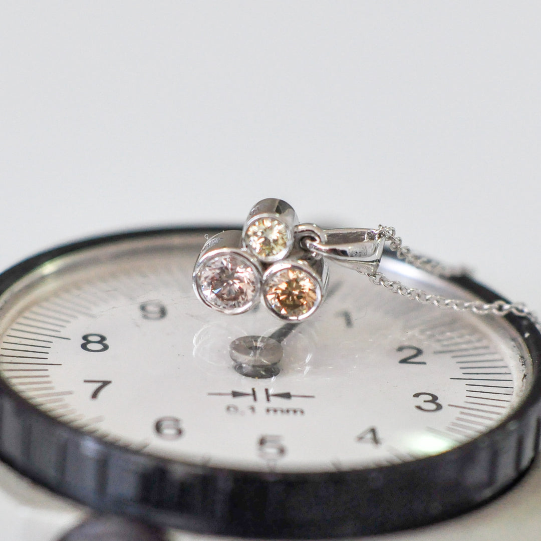 three fancy color diamonds bezel set pendant