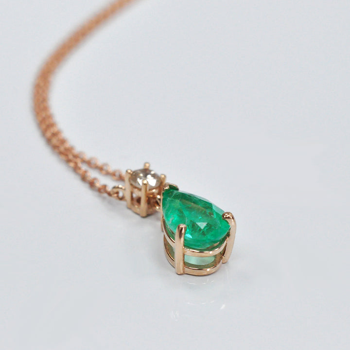 Pear Shape Emerald &amp; round Diamond pendant