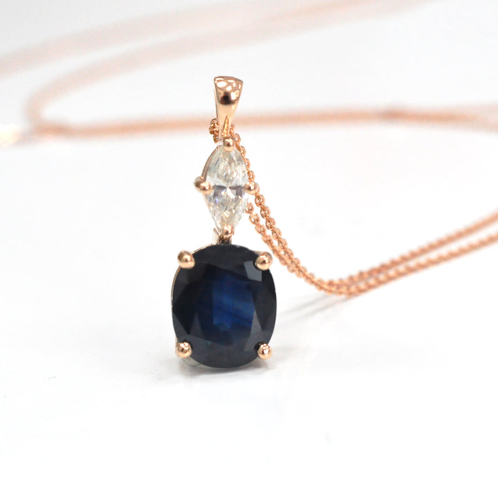 Oval black sapphire and white Diamond pendant