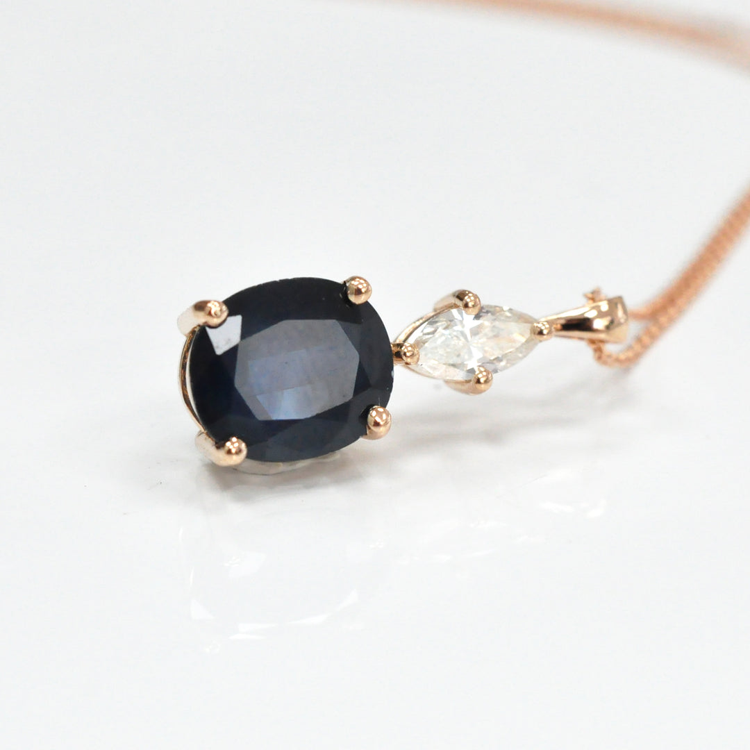 Oval black sapphire and white Diamond pendant