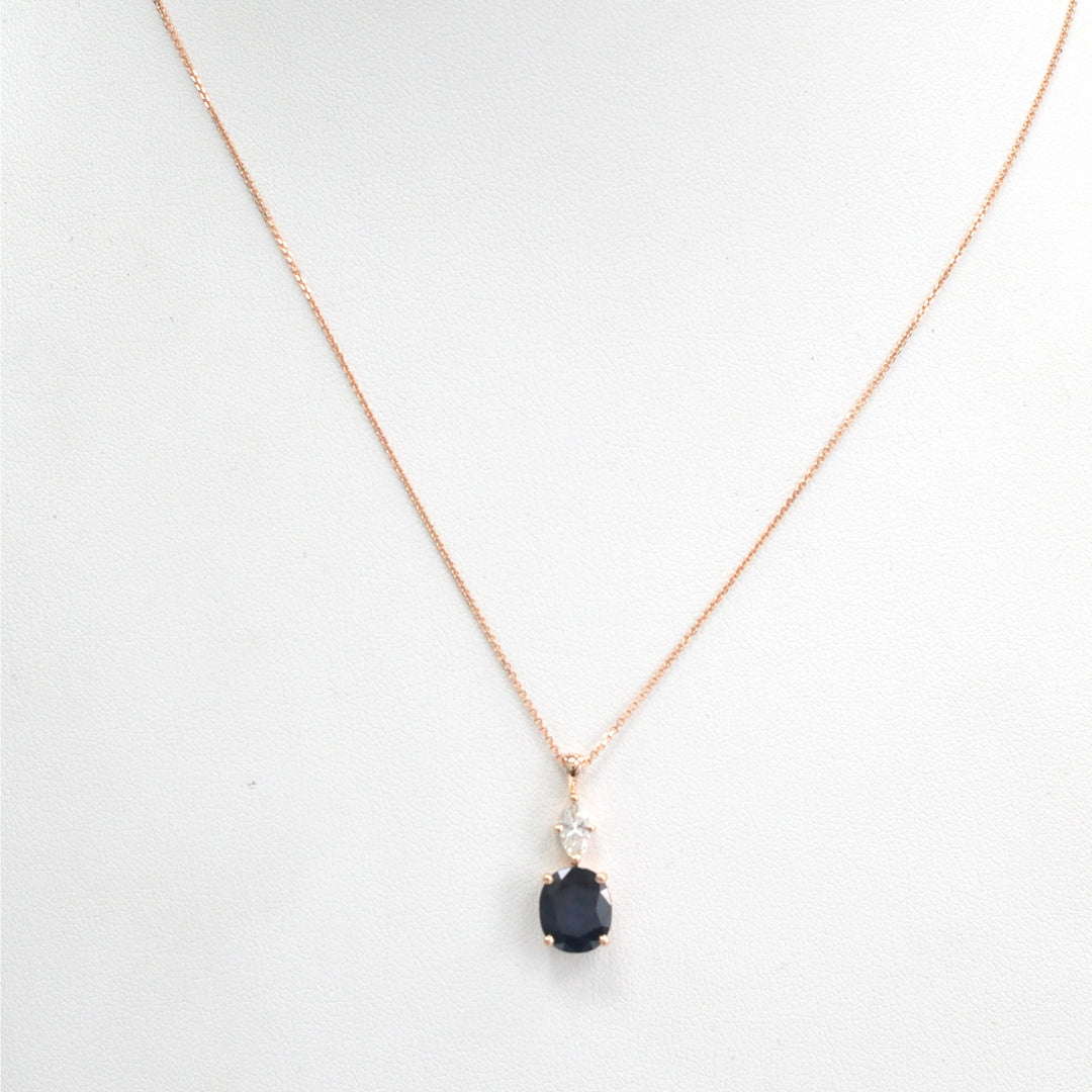 Oval black sapphire and white Diamond pendant