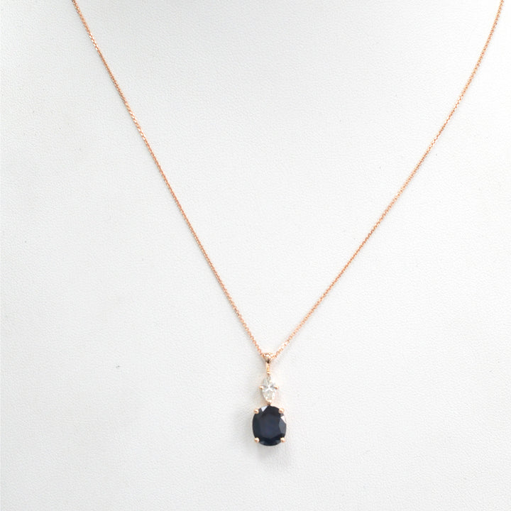 Oval black sapphire and white Diamond pendant