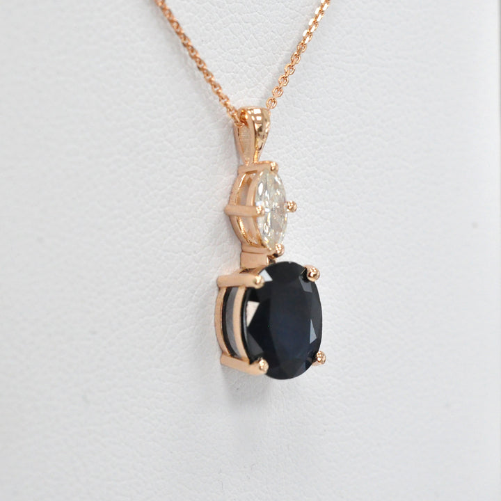 Oval black sapphire and white Diamond pendant