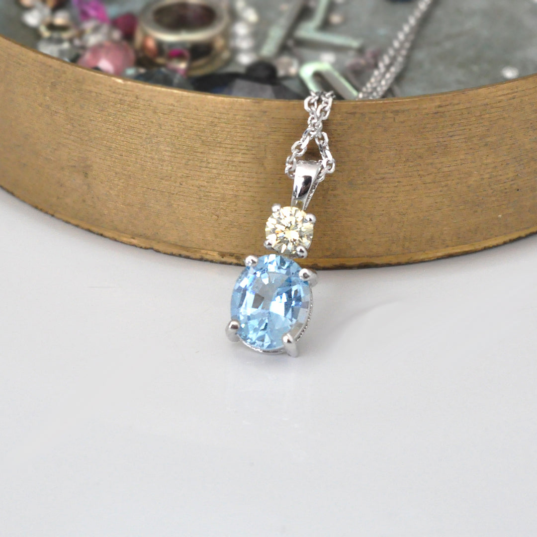 Oval Aquamarine &amp; Diamond white gold pendant