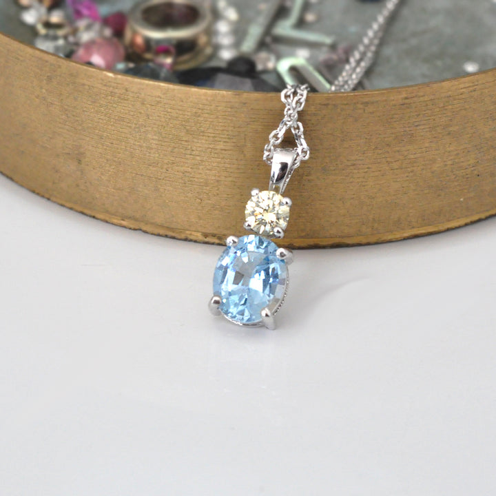 Oval Aquamarine &amp; Diamond white gold pendant