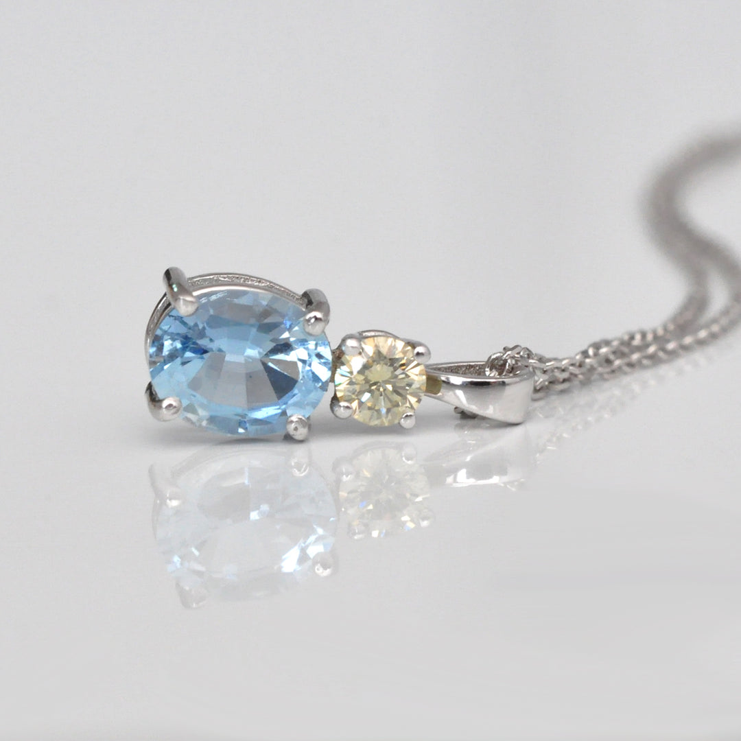 Oval Aquamarine &amp; Diamond white gold pendant