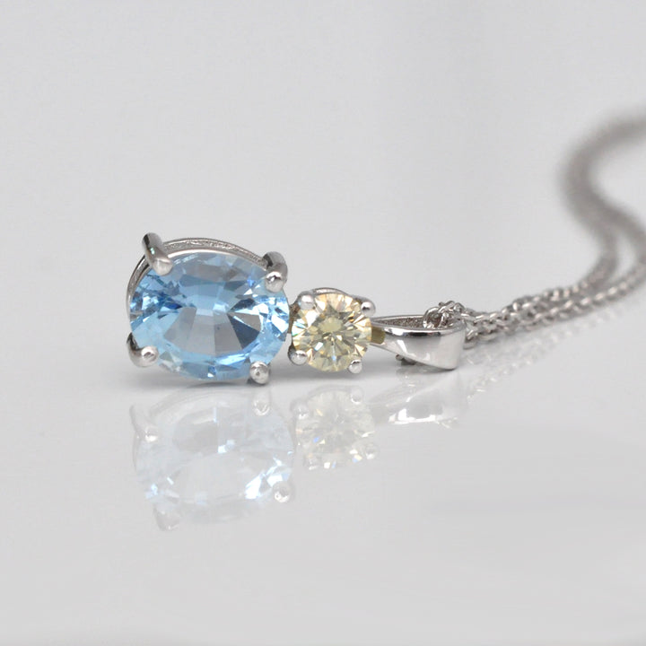 Oval Aquamarine &amp; Diamond white gold pendant