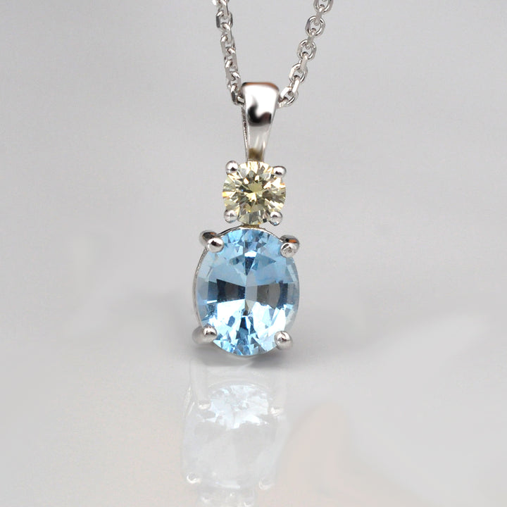 Oval Aquamarine &amp; Diamond white gold pendant