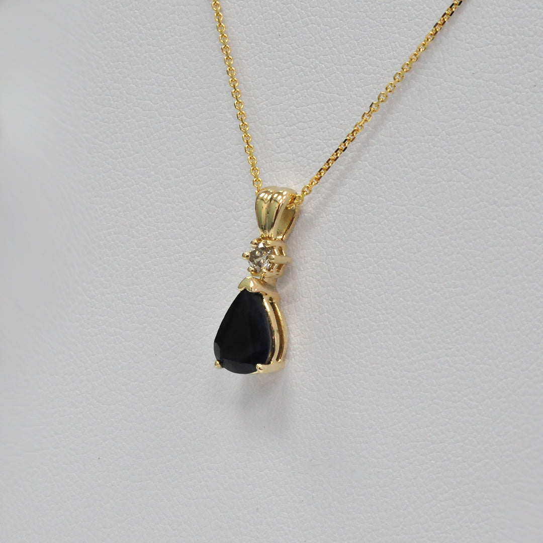 Pear Shape black sapphire and champagne Diamond pendant
