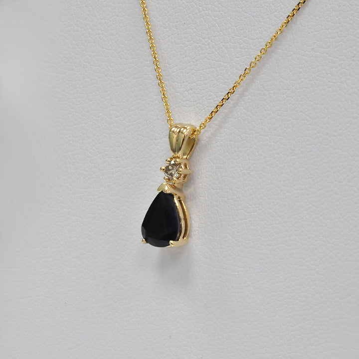 Pear Shape black sapphire and champagne Diamond pendant