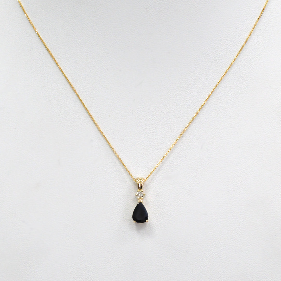 Pear Shape black sapphire and champagne Diamond pendant