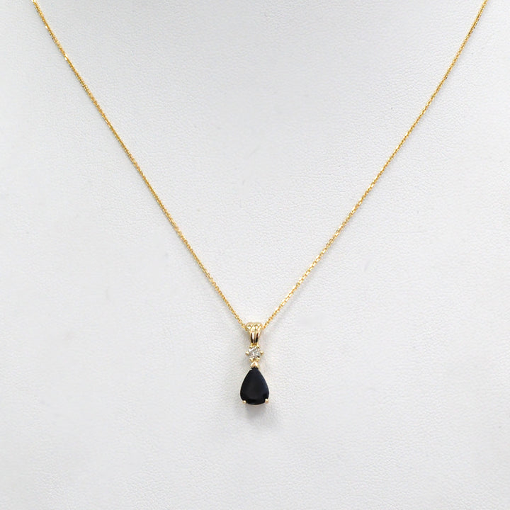 Pear Shape black sapphire and champagne Diamond pendant