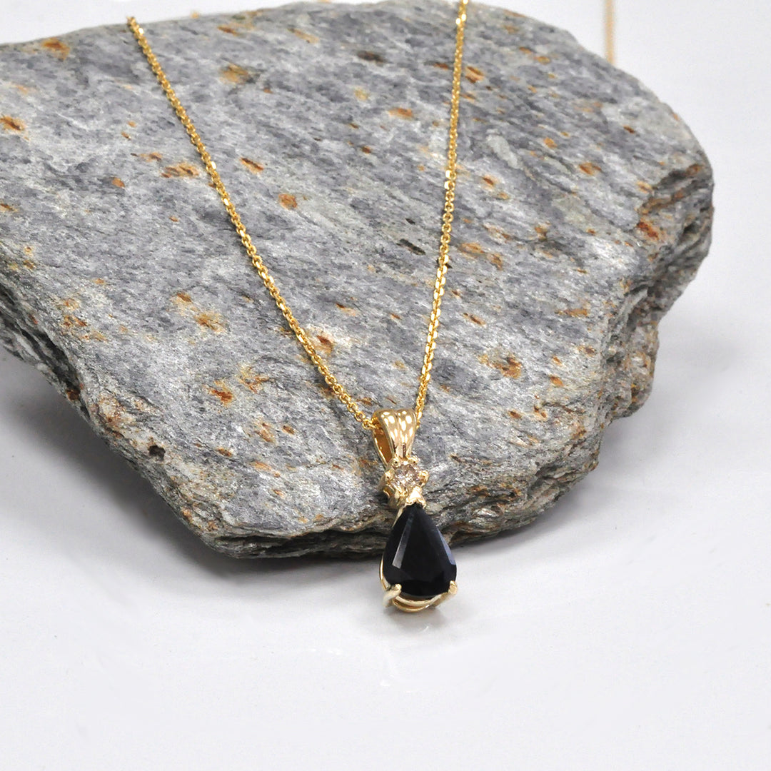 Pear Shape black sapphire and champagne Diamond pendant