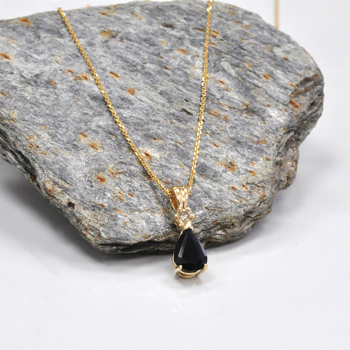 Pear Shape black sapphire and champagne Diamond pendant