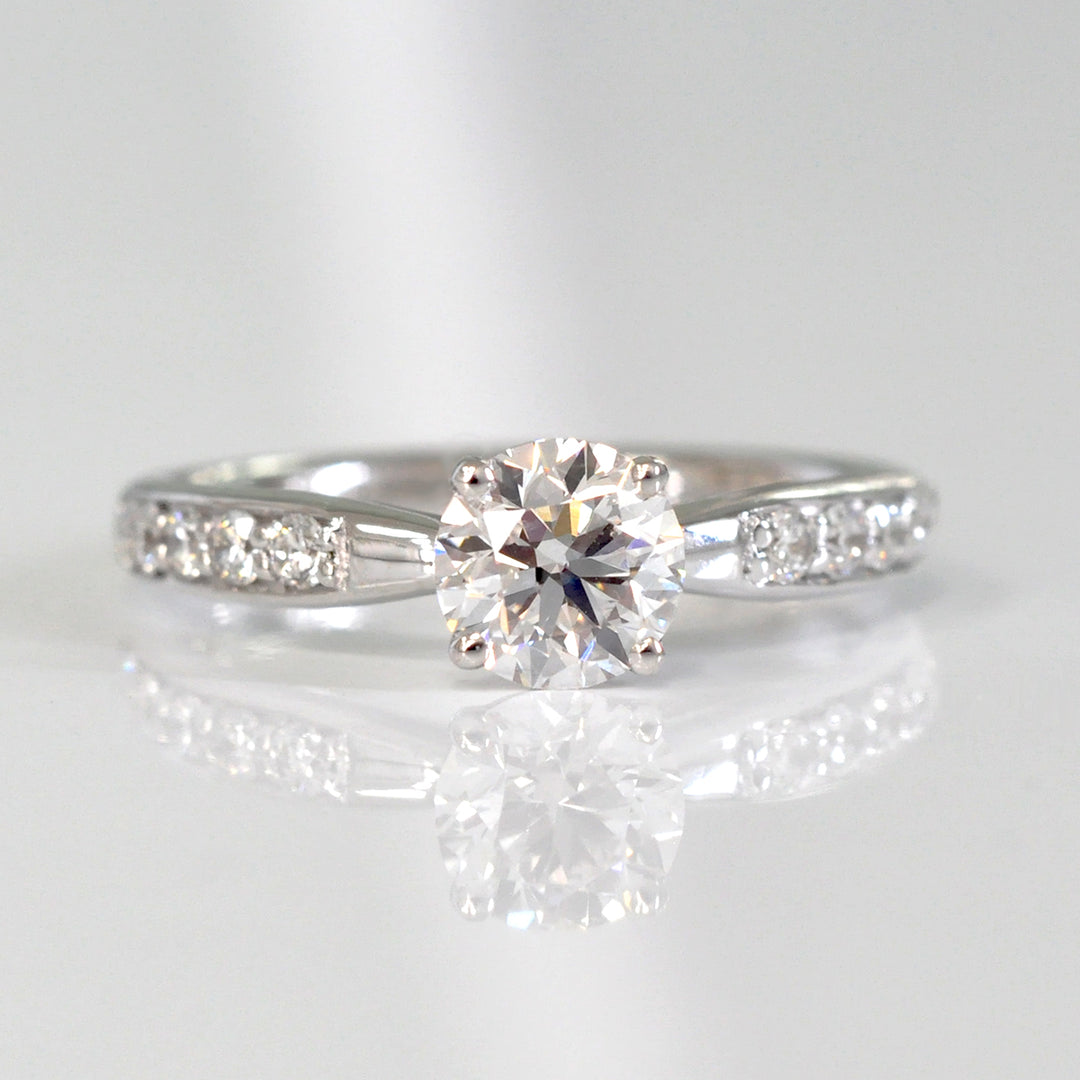 Center &amp; side diamonds engagement ring