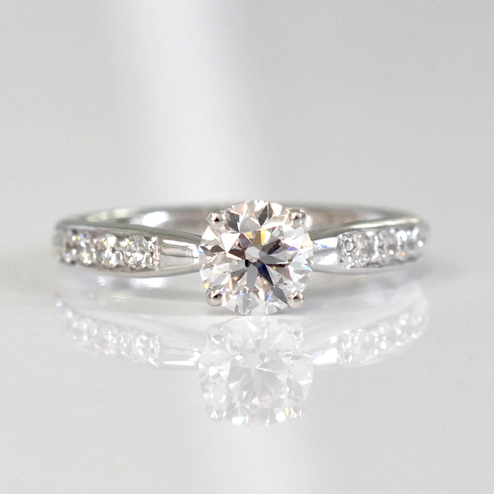 Center &amp; side diamonds engagement ring