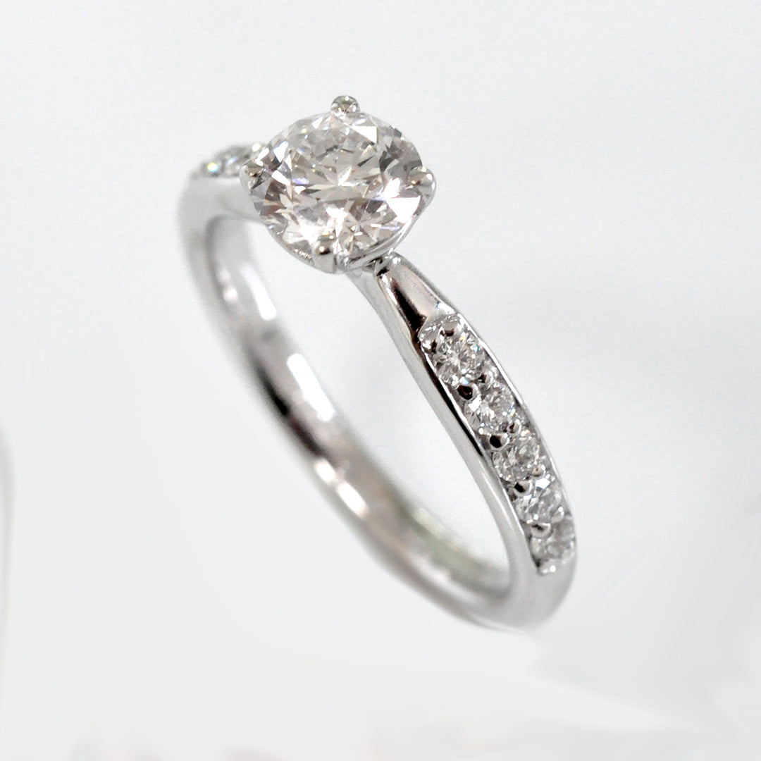 Center &amp; side diamonds engagement ring