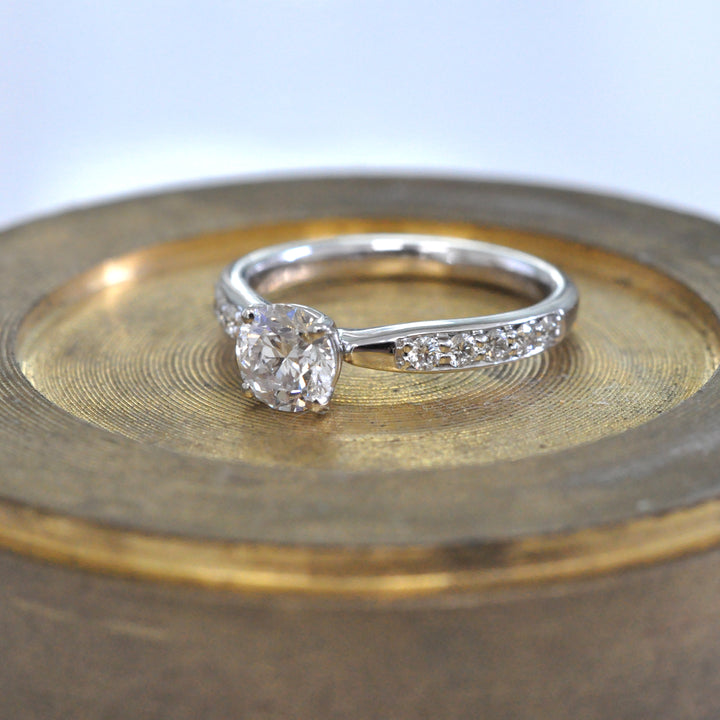 Center &amp; side diamonds engagement ring
