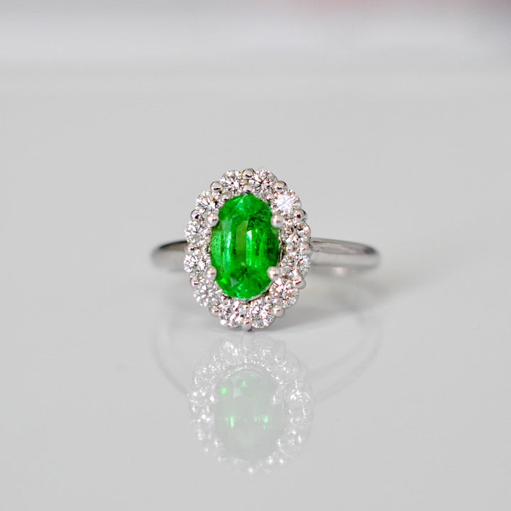 Green Tsavorite and white diamonds Diana style halo ring