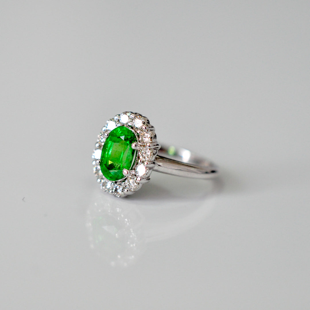 Green Tsavorite and white diamonds Diana style halo ring