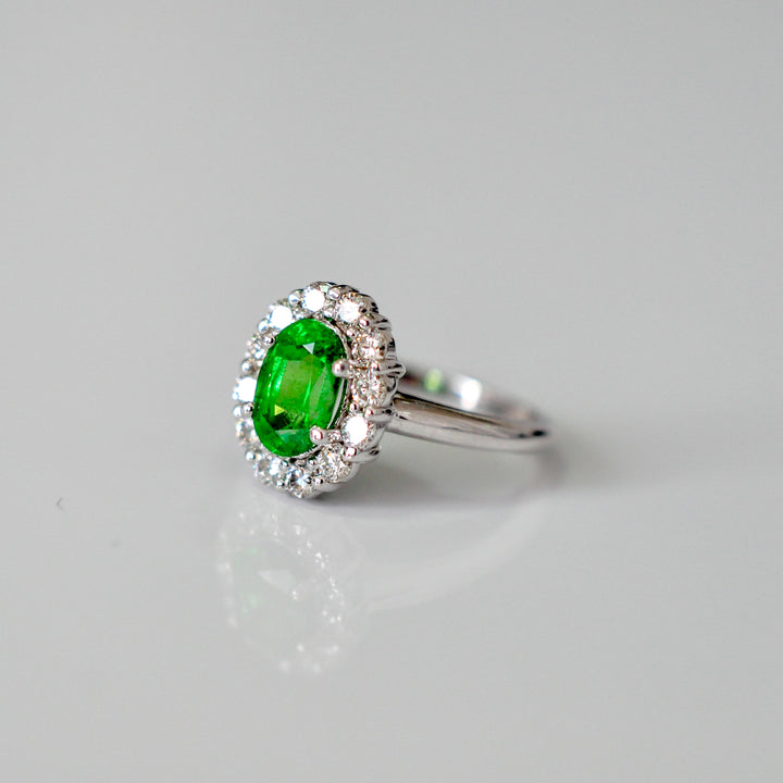Green Tsavorite and white diamonds Diana style halo ring