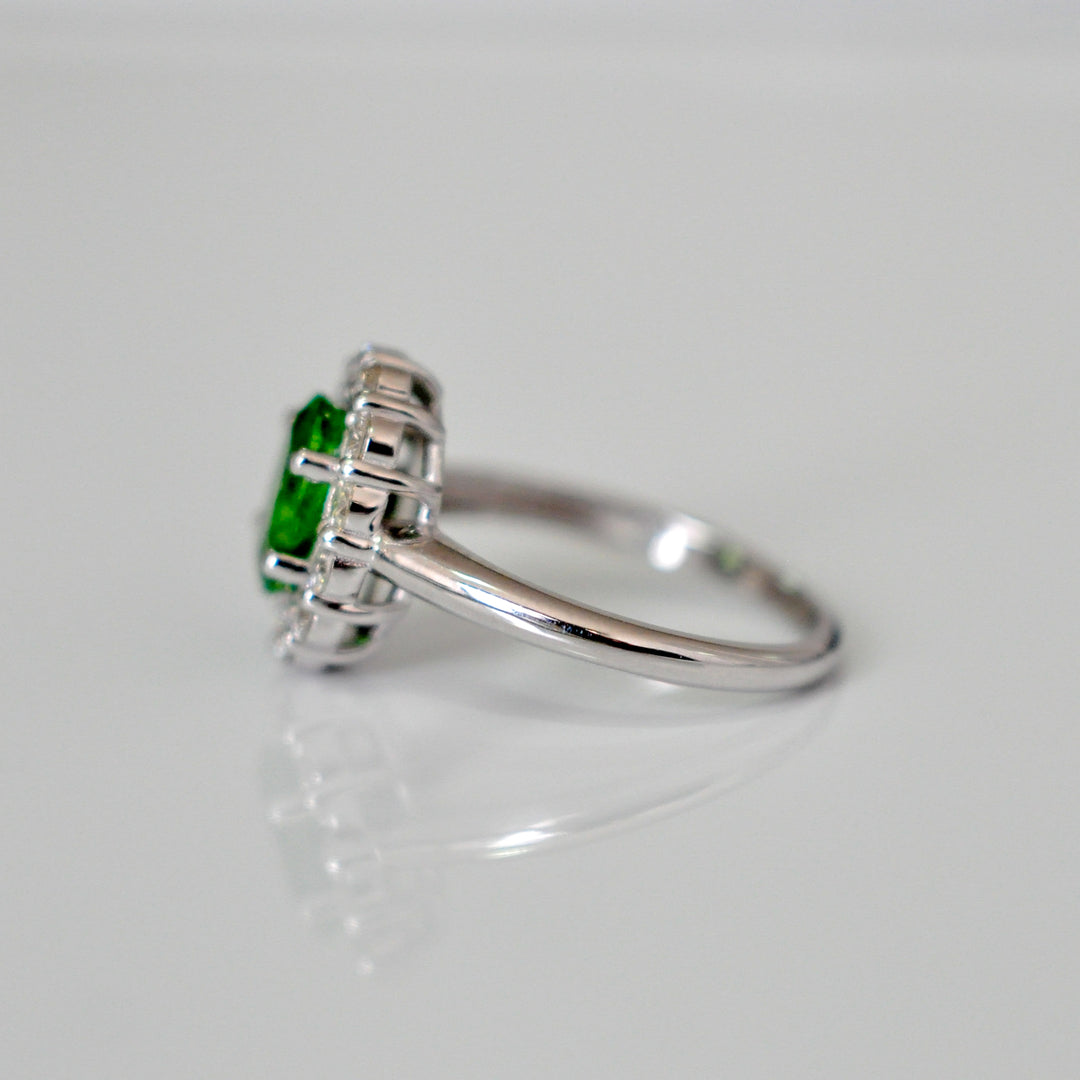 Green Tsavorite and white diamonds Diana style halo ring