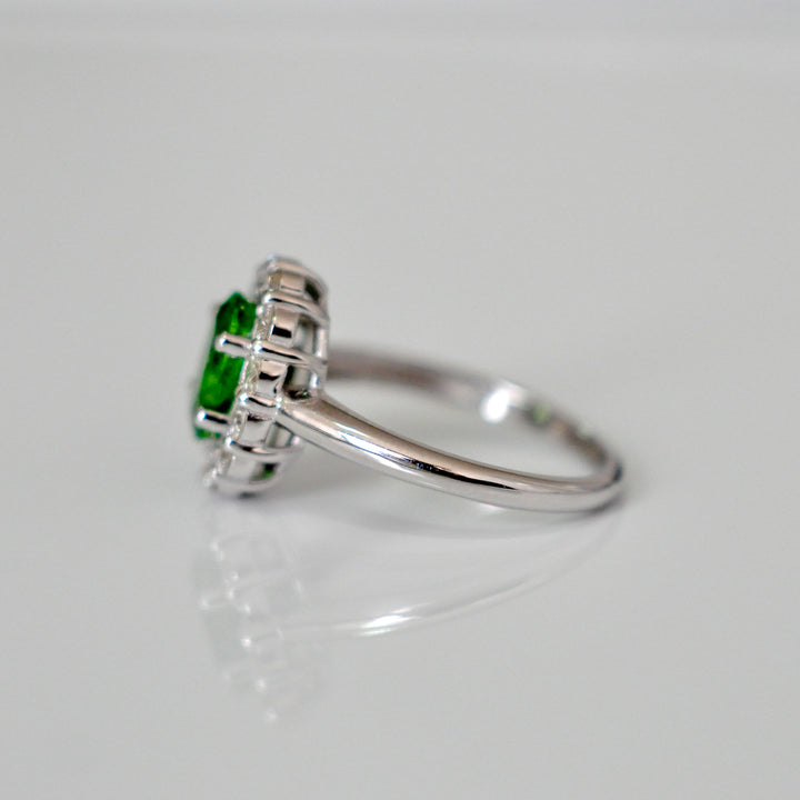 Green Tsavorite and white diamonds Diana style halo ring