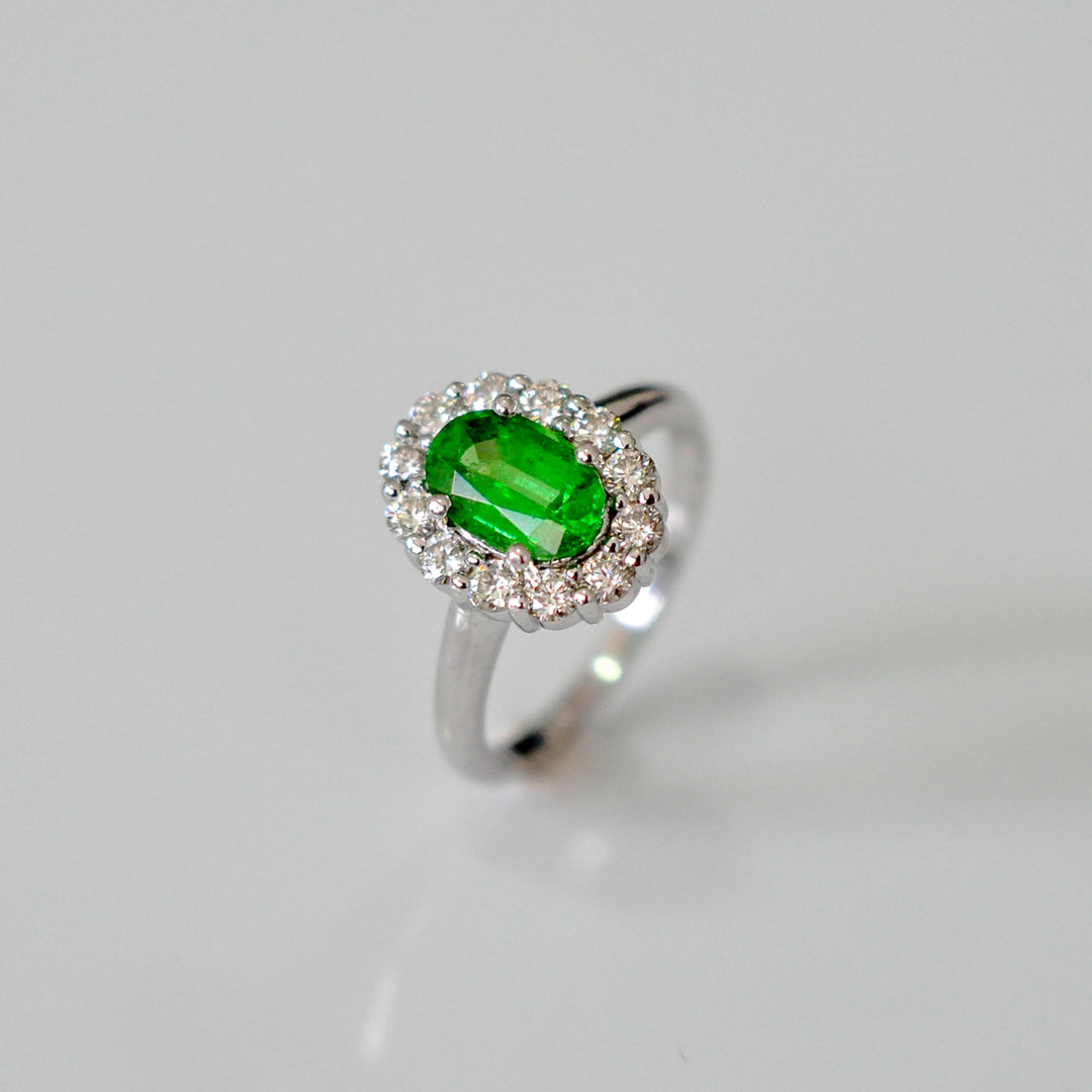 Green Tsavorite and white diamonds Diana style halo ring