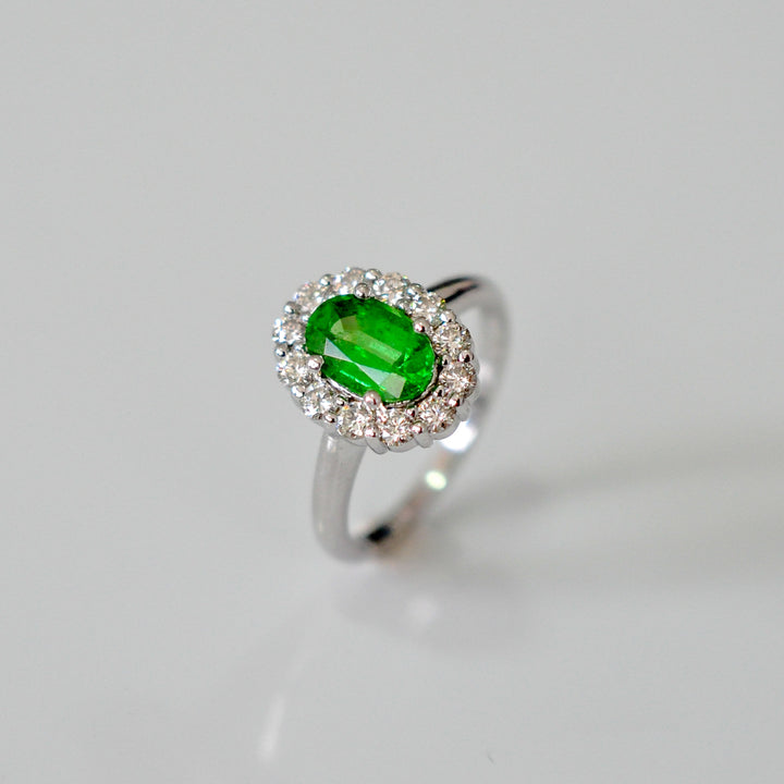 Green Tsavorite and white diamonds Diana style halo ring