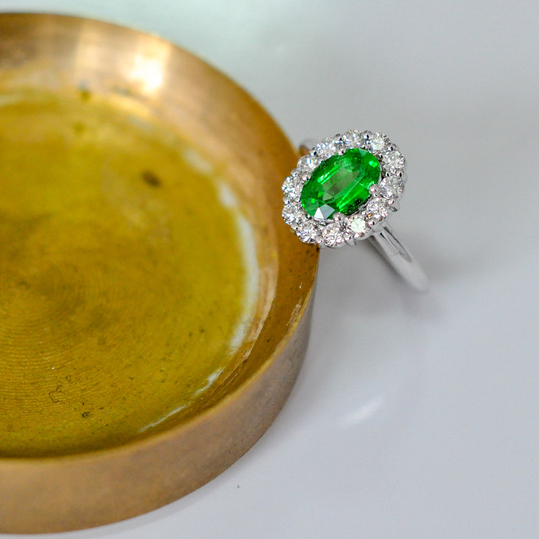 Green Tsavorite and white diamonds Diana style halo ring