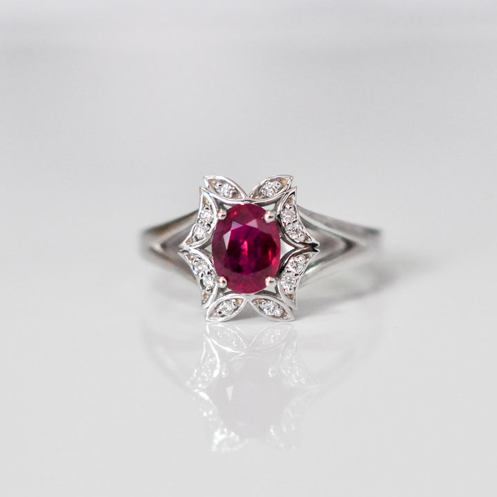 OVAL RUBY and diamonds FLOWER SHAPE HALO RING