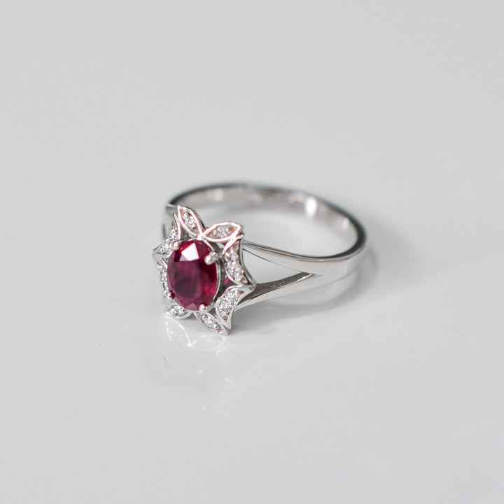 OVAL RUBY and diamonds FLOWER SHAPE HALO RING
