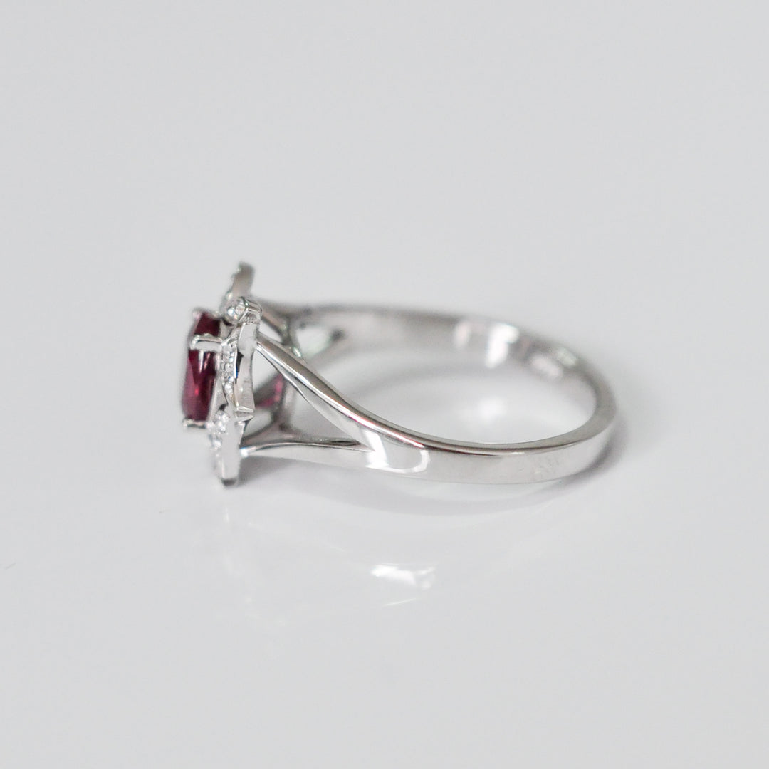 OVAL RUBY and diamonds FLOWER SHAPE HALO RING