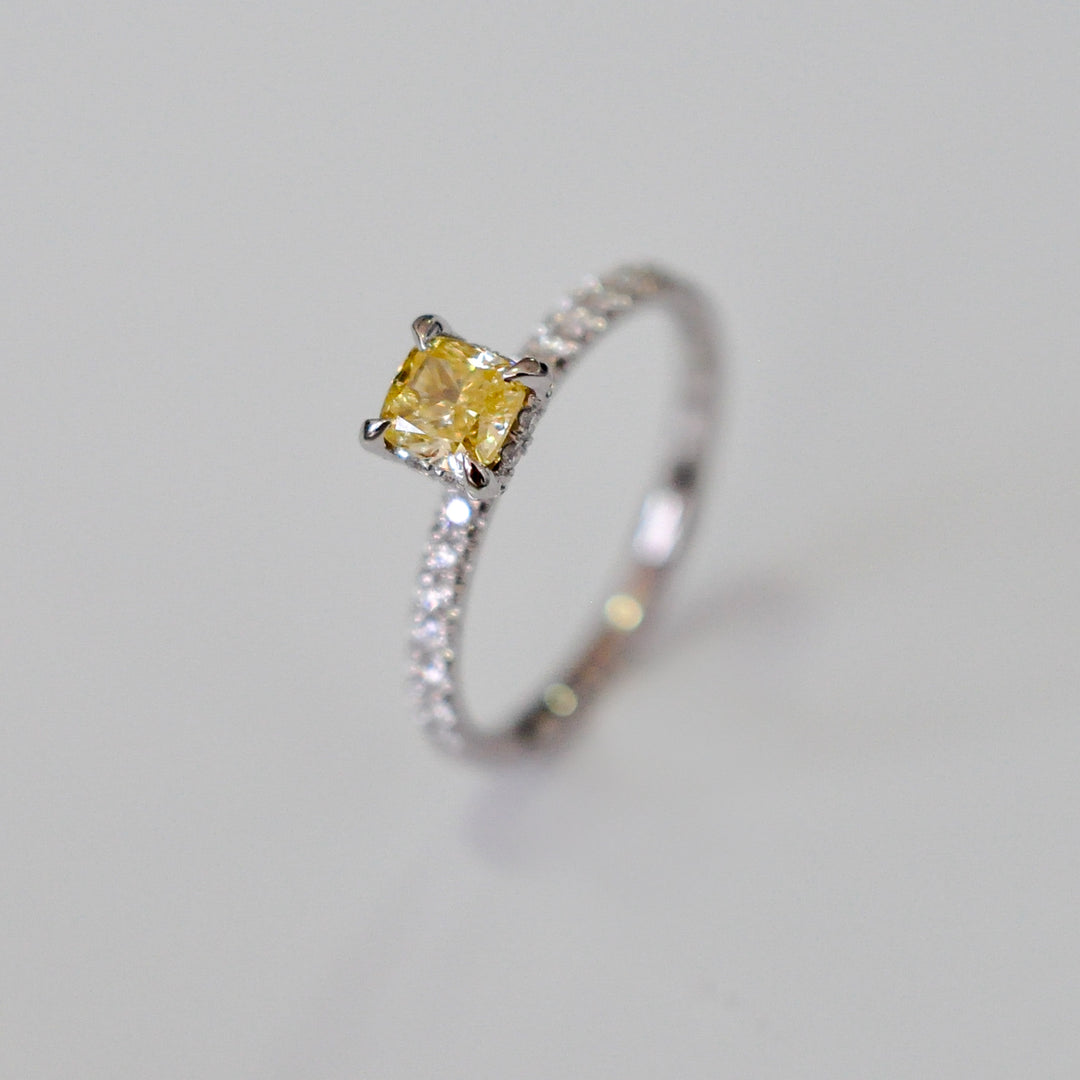 yellow cushion diamond &amp; white diamonds ring
