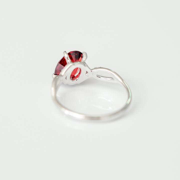 RED GARNET (1.5 ct.) &amp; DIAMONDS WHITE GOLD TWIST STYLE RING