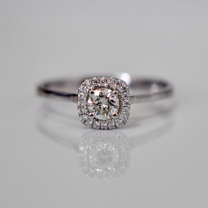 WHITE GOLD AND WHITE DIAMONDS HALO RING