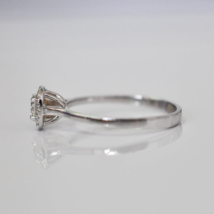 WHITE GOLD AND WHITE DIAMONDS HALO RING