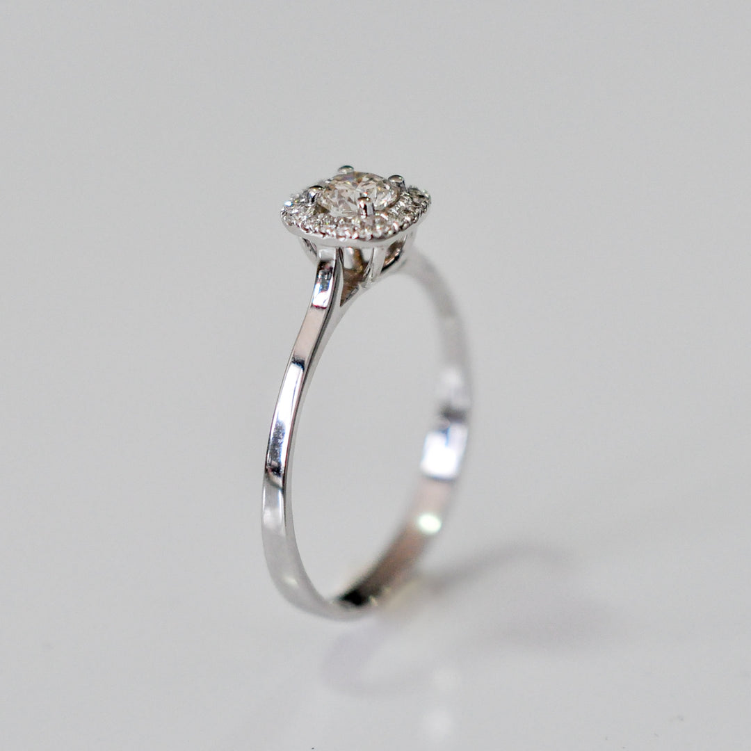 WHITE GOLD AND WHITE DIAMONDS HALO RING