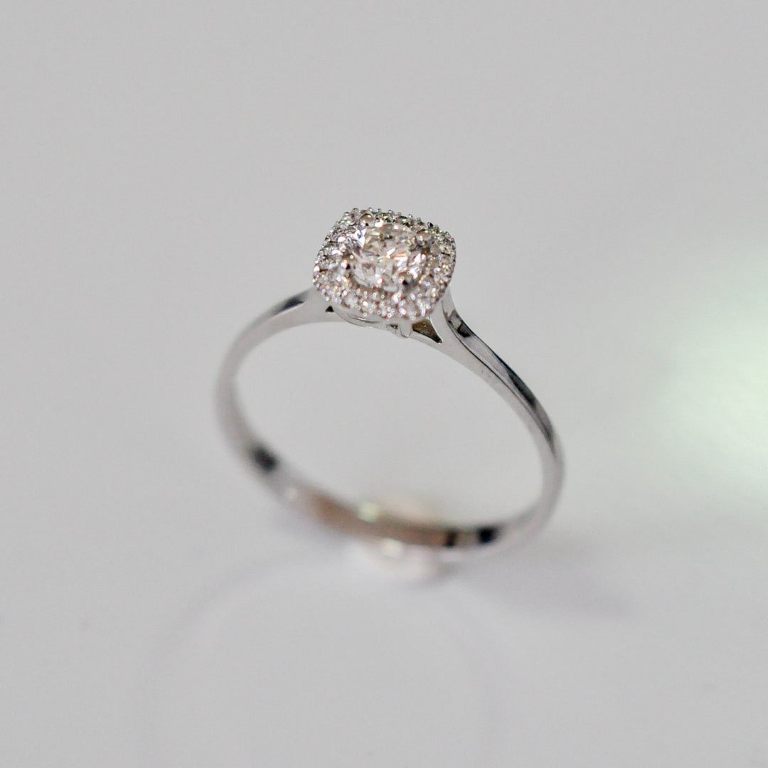 WHITE GOLD AND WHITE DIAMONDS HALO RING