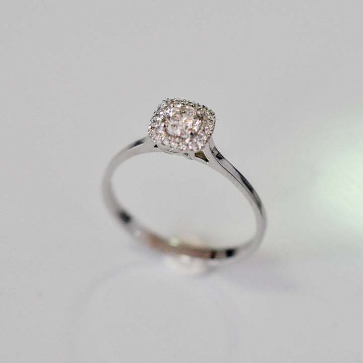 WHITE GOLD AND WHITE DIAMONDS HALO RING